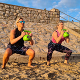 Kettlebell sessions on the beach in Strengthwork Shorts and Leggings
